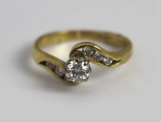 Diamond Single Stone Crossover Twist Yellow Gold Ring