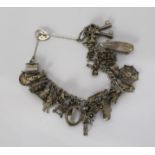 Vintage Silver Charm Bracelet with 30 Charms