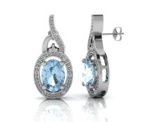9ct White Gold Diamond And Blue Topaz Earring
