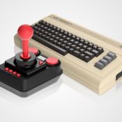 (R14F) 2x The C64 Mini. 64 Games Included. (1x Joystick Damaged)