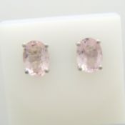 A pair of oval morganite gemstone and silver stud earrings