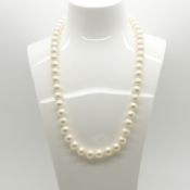 A necklace strung with white cultured pearls and fitted with a 9ct yellow gold clasp
