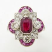 An Edwardian / Deco-style platinum ring set with rubies and diamonds