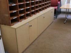 Hinged door unit x3, Open pigeon hole unit, Table x2, Meeting chairs x15, Flip chart, Pinboard x7.