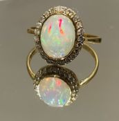 Beautiful Natural Opal Ring With Diamonds and 18k Gold