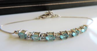 Blue and White Topaz Bracelet in Sterling Silver