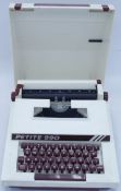 Vintage Petite 990 Model Typewriter