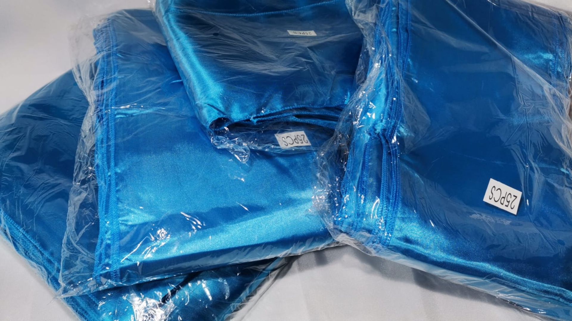 100 (4 packs of 25) Turquoise Satin Wedding Chair Sashes. RRP £100