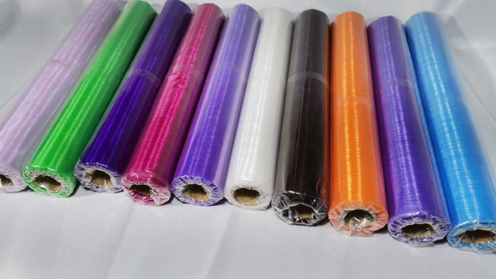 10 Rolls of 10m Mixed Colour Sheer Organza Material. RRP £70 - Image 3 of 4