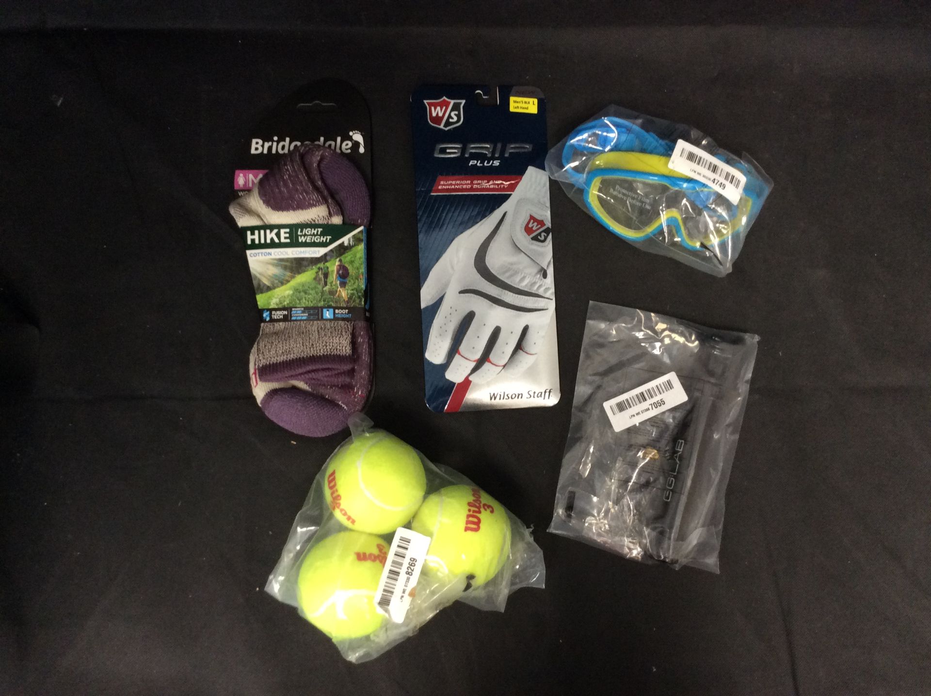 Mixed Bag of Sports Items To Include Sports Socks, Goggles, ect