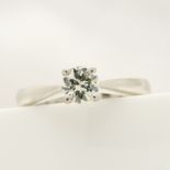 An 18ct white gold 0.28 carat round brilliant-cut diamond solitaire ring with certificate