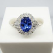 A stylish 18ct white gold tanzanite and diamond cluster ring