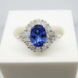 A stylish 18ct white gold tanzanite and diamond cluster ring