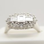 0.50 ct baguette and round brilliant-cut diamond cluster ring, in 18ct white gold