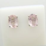 A pair of oval morganite gemstone and silver stud earrings