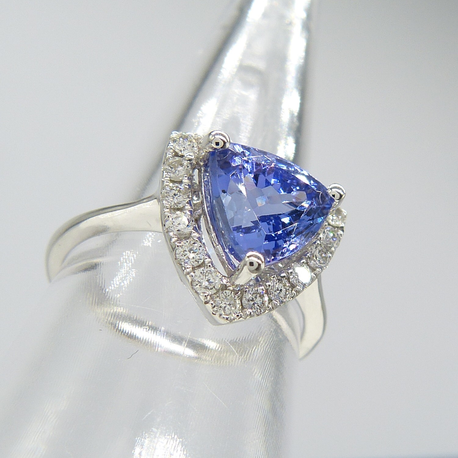 A superb 1.88ct trilliant-cut tanzanite and diamond halo dress ring in 18ct white gold - Image 5 of 7