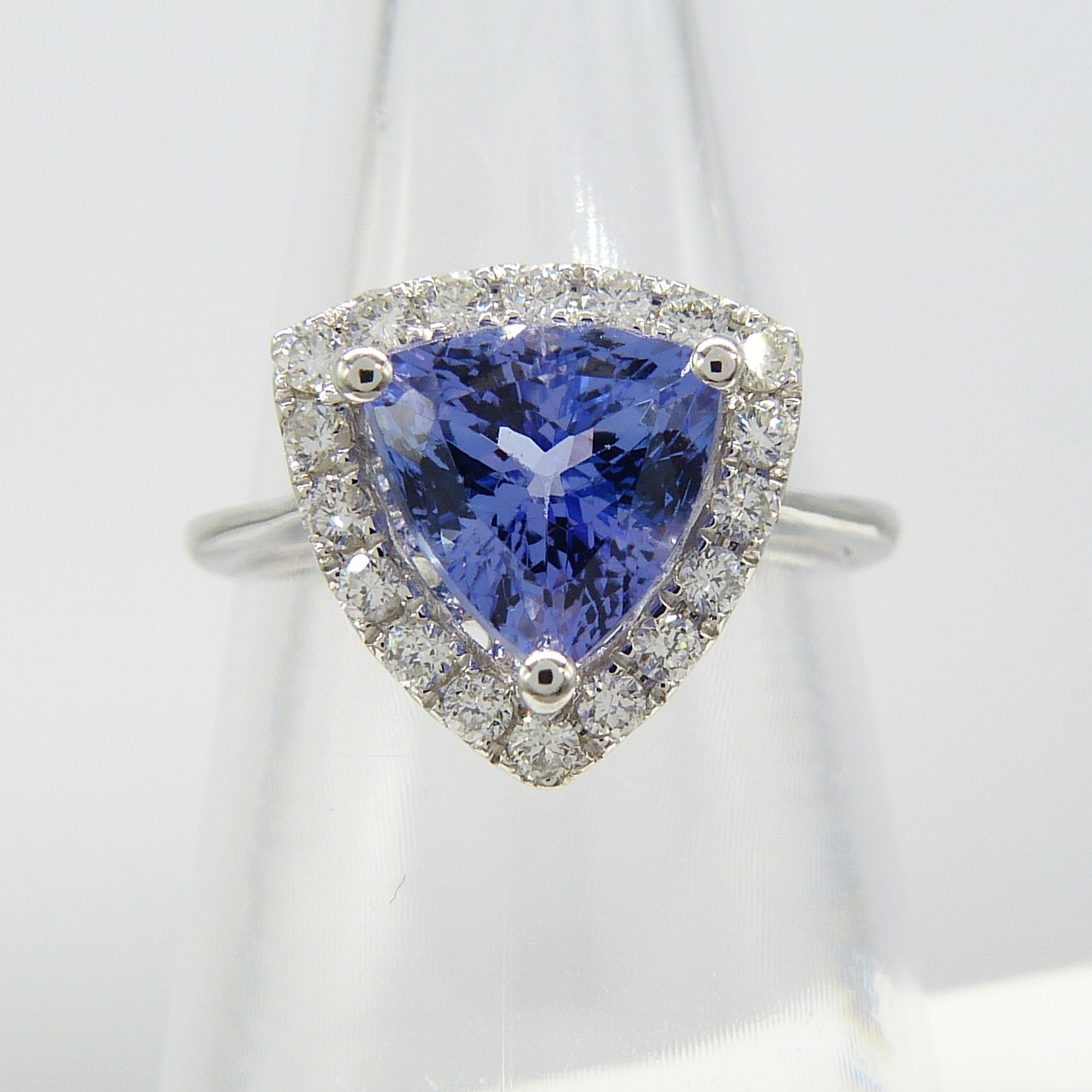 A superb 1.88ct trilliant-cut tanzanite and diamond halo dress ring in 18ct white gold - Image 6 of 7