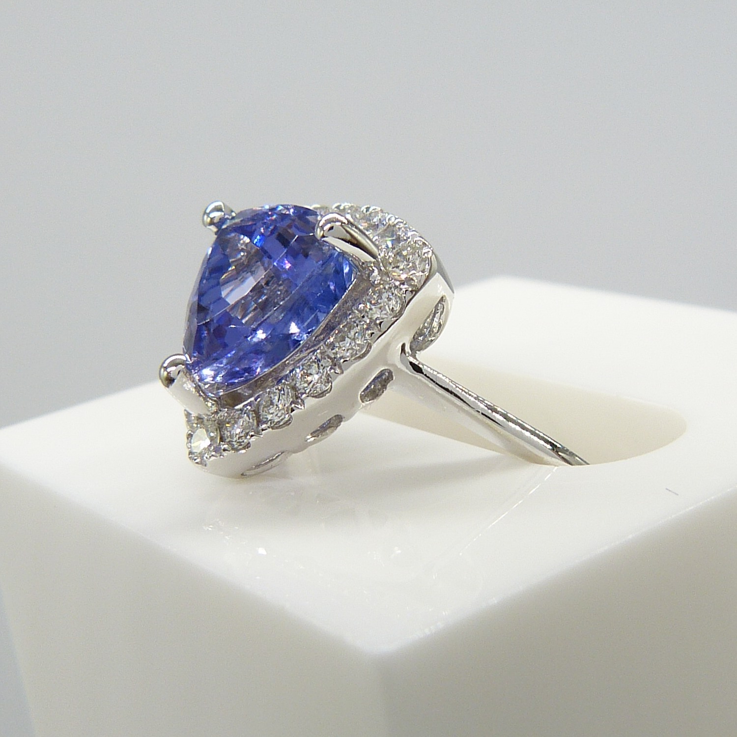 A superb 1.88ct trilliant-cut tanzanite and diamond halo dress ring in 18ct white gold - Image 2 of 7