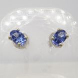 A pair of silver oval tanzanite stud earrings