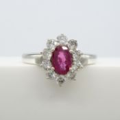 A ruby and diamond (F-G colour) cluster ring in 18ct white gold, with certificate