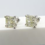 A pair of 18ct white gold 2.00ct princess-cut diamond stud earrings with screw backs, boxed