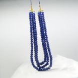 An unusual 990.00 carat faceted, 3-strand, extra-long natural earth-mined sapphire bead necklace