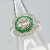 An Art Deco-inspired 14ct white gold 1.33ct diamond and 0.40ct emerald target ring with certificate