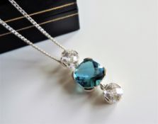 Sterling Silver 12.5 ct Blue and White Topaz Pendant Necklace