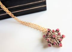 Gold on Sterling Silver Ruby Snowflake Pendant Necklace