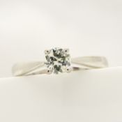 An 18ct white gold 0.28 carat round brilliant-cut diamond solitaire ring with certificate