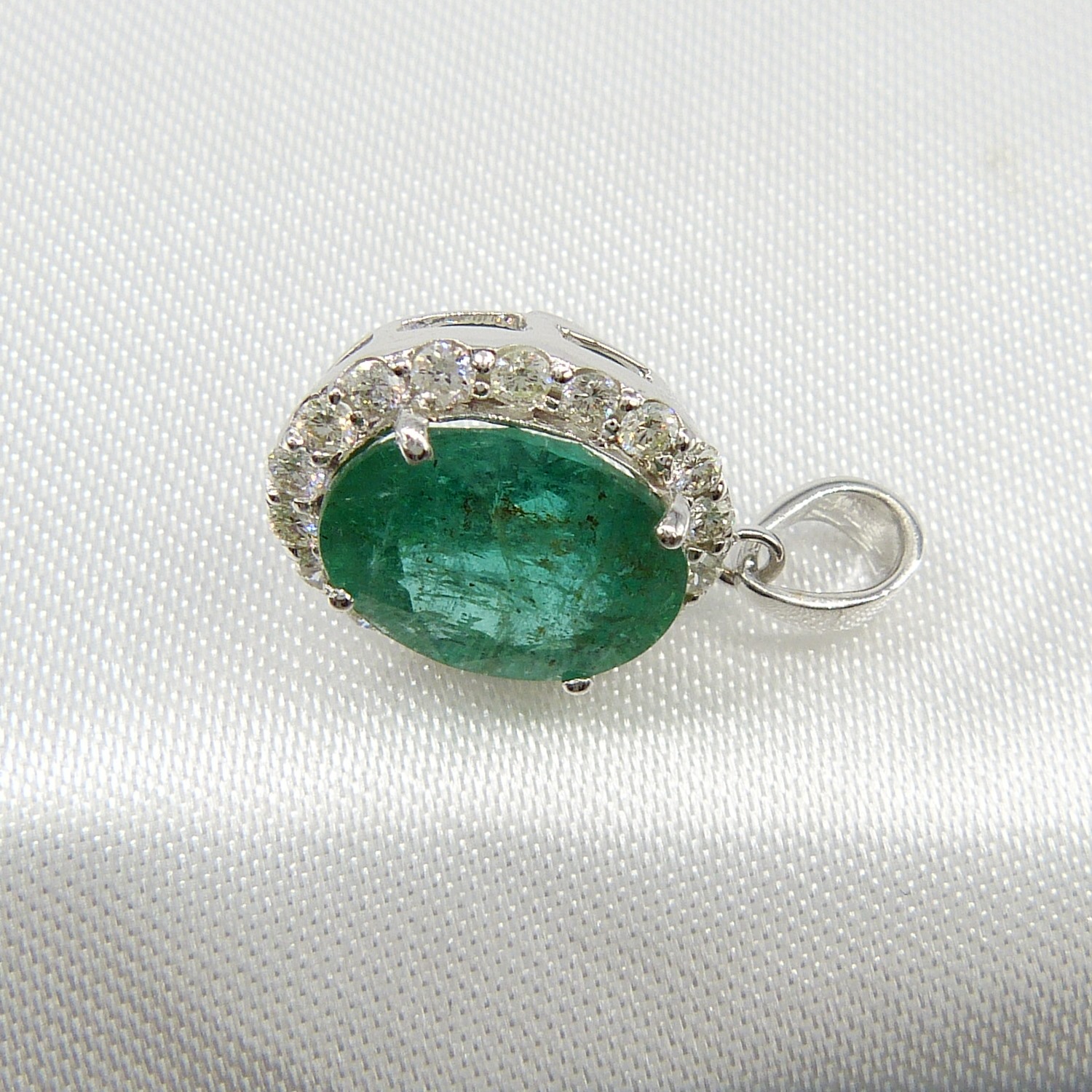 A large emerald and diamond halo pendant in 18ct white gold - Image 6 of 7
