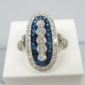 A stunning 1.00ct diamond and 1.45ct blue sapphire cocktail ring in platinum