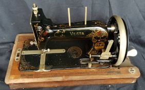 Antique Vesta Sewing Machine In Original Case. Measures 16 inches long.