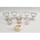 Vintage Antique 8 x Clear Glass Eye Baths and 1 Ceramic. The tallest measures 2.5 inches tall.