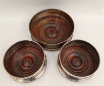 Antique 3 x Silver Plate on Copper Bottle Coasters They have hardwood possibly mahogany bases