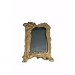 Brass Art Nouveau Style Picture Frame. Measures 6 inches tall by 4 inches wide.