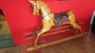 Carved wooden rocking horse