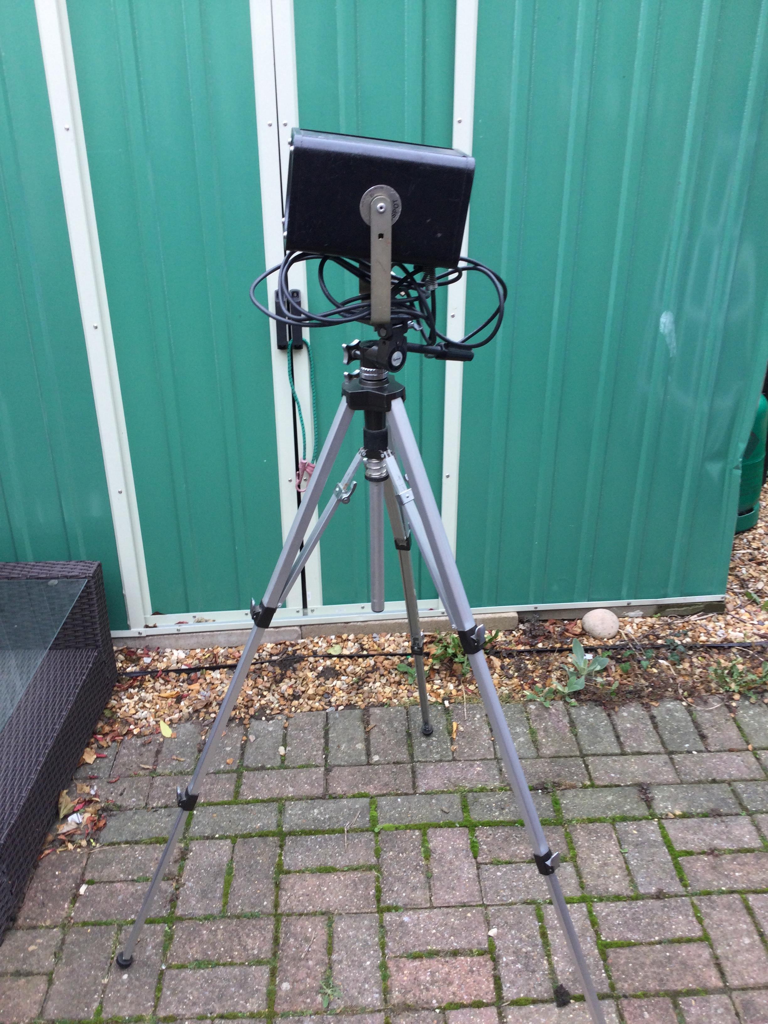 Vintage theatre light mounted on tripod