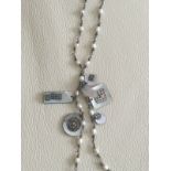 Boutique Rice/ Seed Pearl necklace with mother of Pearl tassle