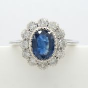 An 18ct white Gold blue Sapphire Diamond ring with World Gemological Institute certificate