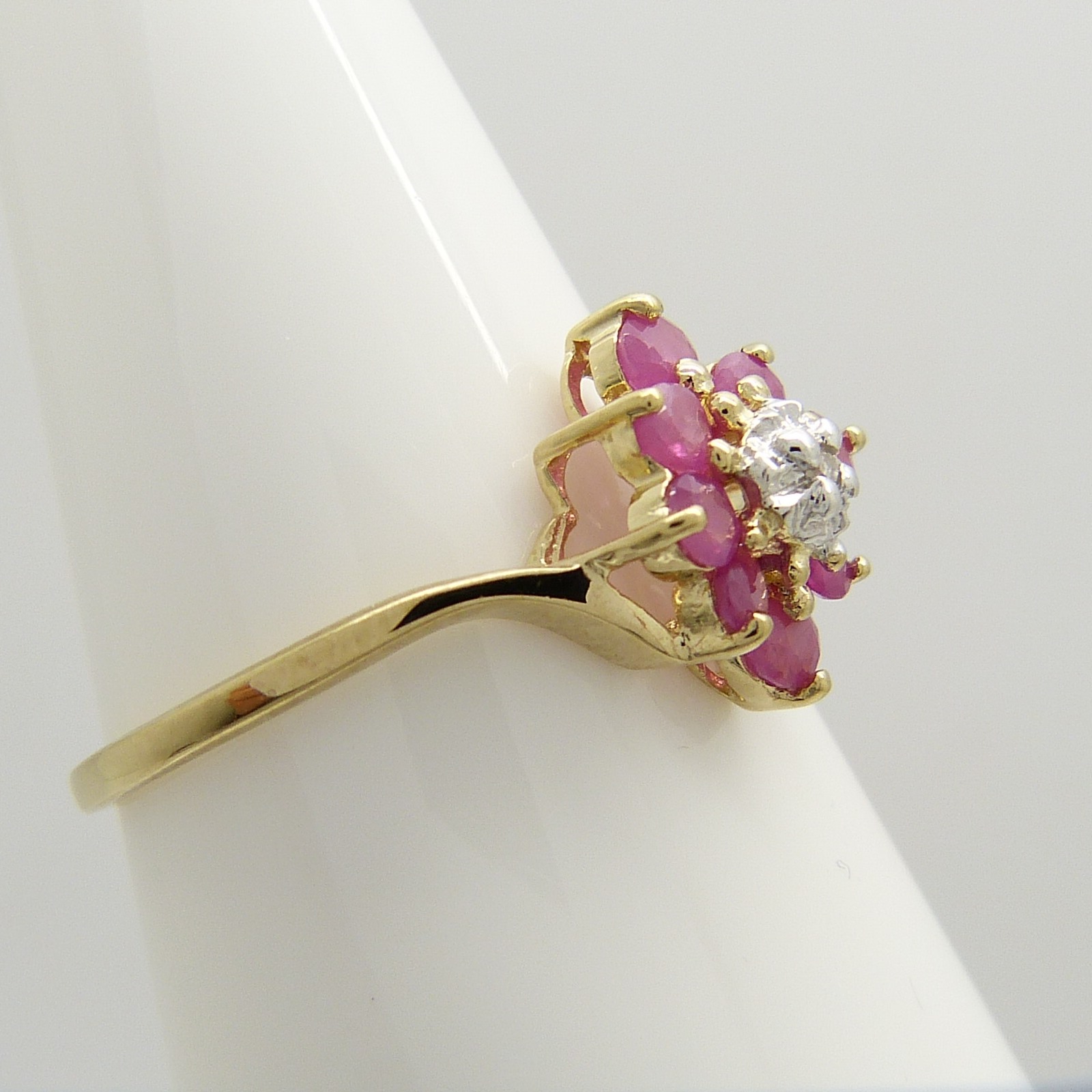 A Ruby and Diamond cluster dress ring in 9ct yellow Gold - Image 5 of 6