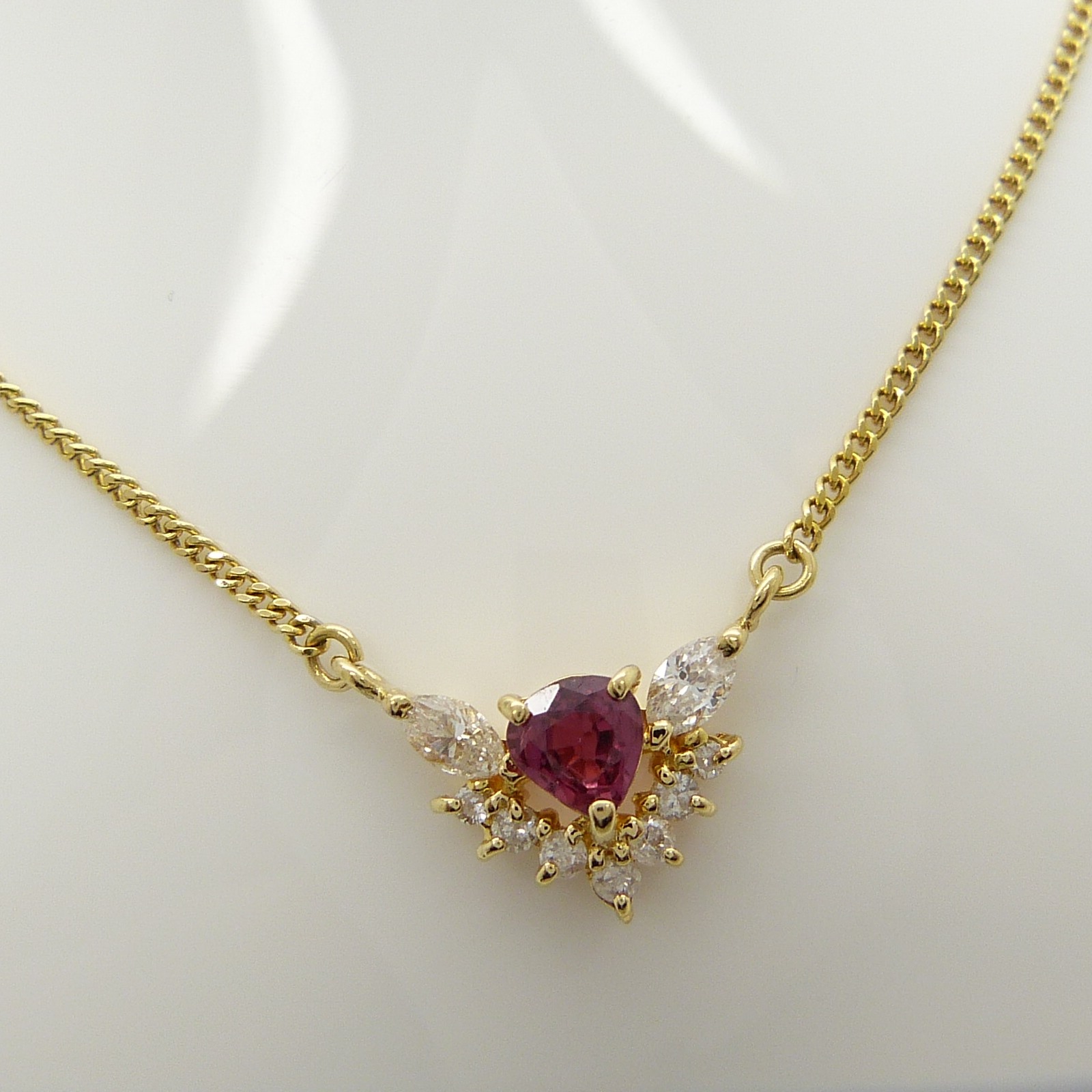 A stylish ruby and marquise diamond necklace in 18ct yellow gold, boxed - Image 7 of 10