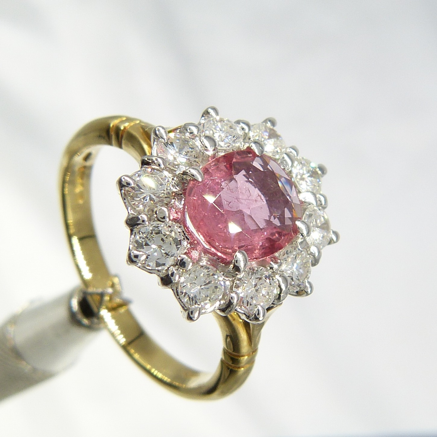 A pinkish-red natural Ruby and Diamond cluster ring in 18ct yellow and white Gold - Image 3 of 10