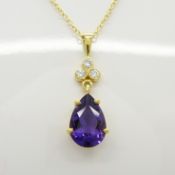An attractive 18ct yellow gold amethyst and diamond necklace, boxed