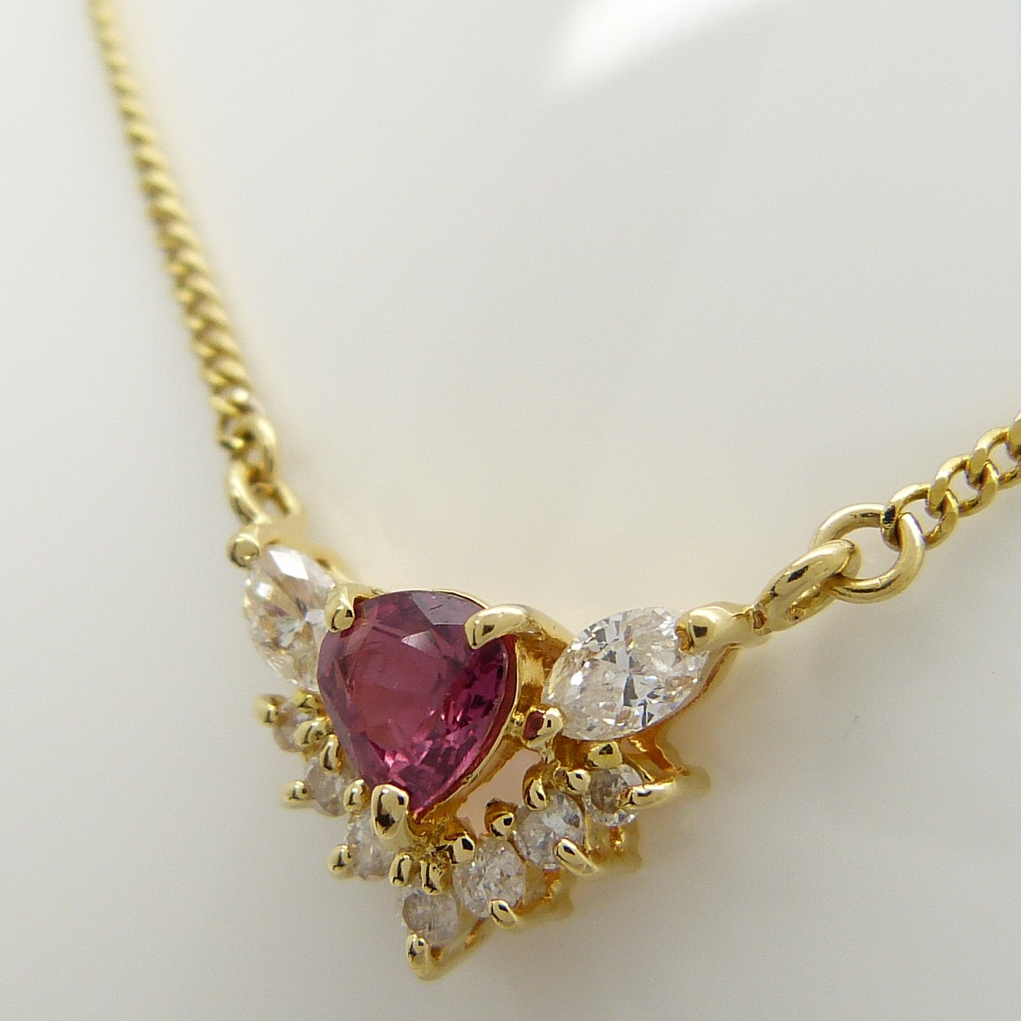 A stylish ruby and marquise diamond necklace in 18ct yellow gold, boxed - Image 8 of 10