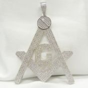 A large and weighty Silver Masonic pendant pavé -set with several hundred Cubic Zirconia stones