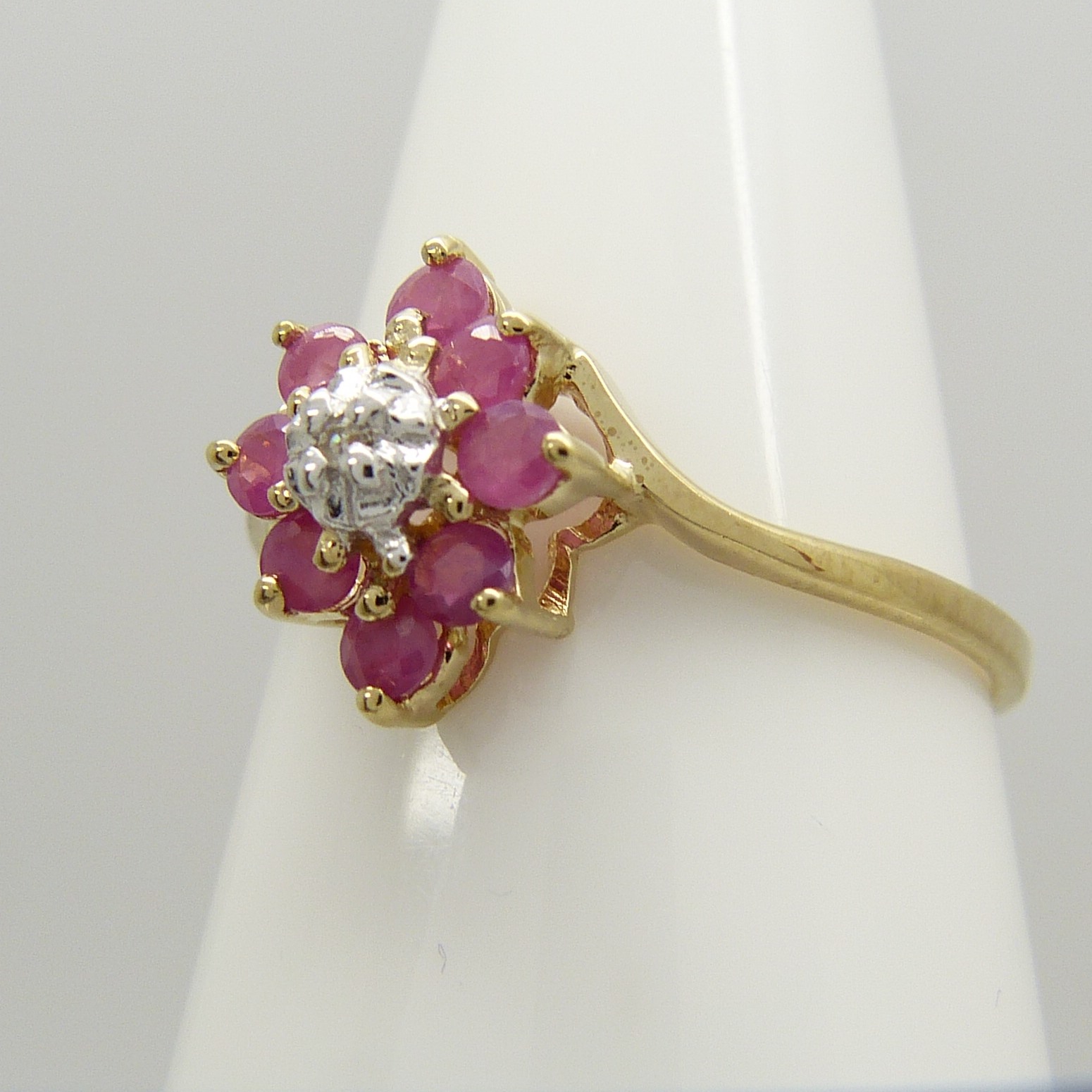 A Ruby and Diamond cluster dress ring in 9ct yellow Gold - Image 3 of 6