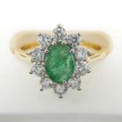 A certificated 18ct yellow Gold oval Emerald gemstone and round brilliant-cut Diamond ring