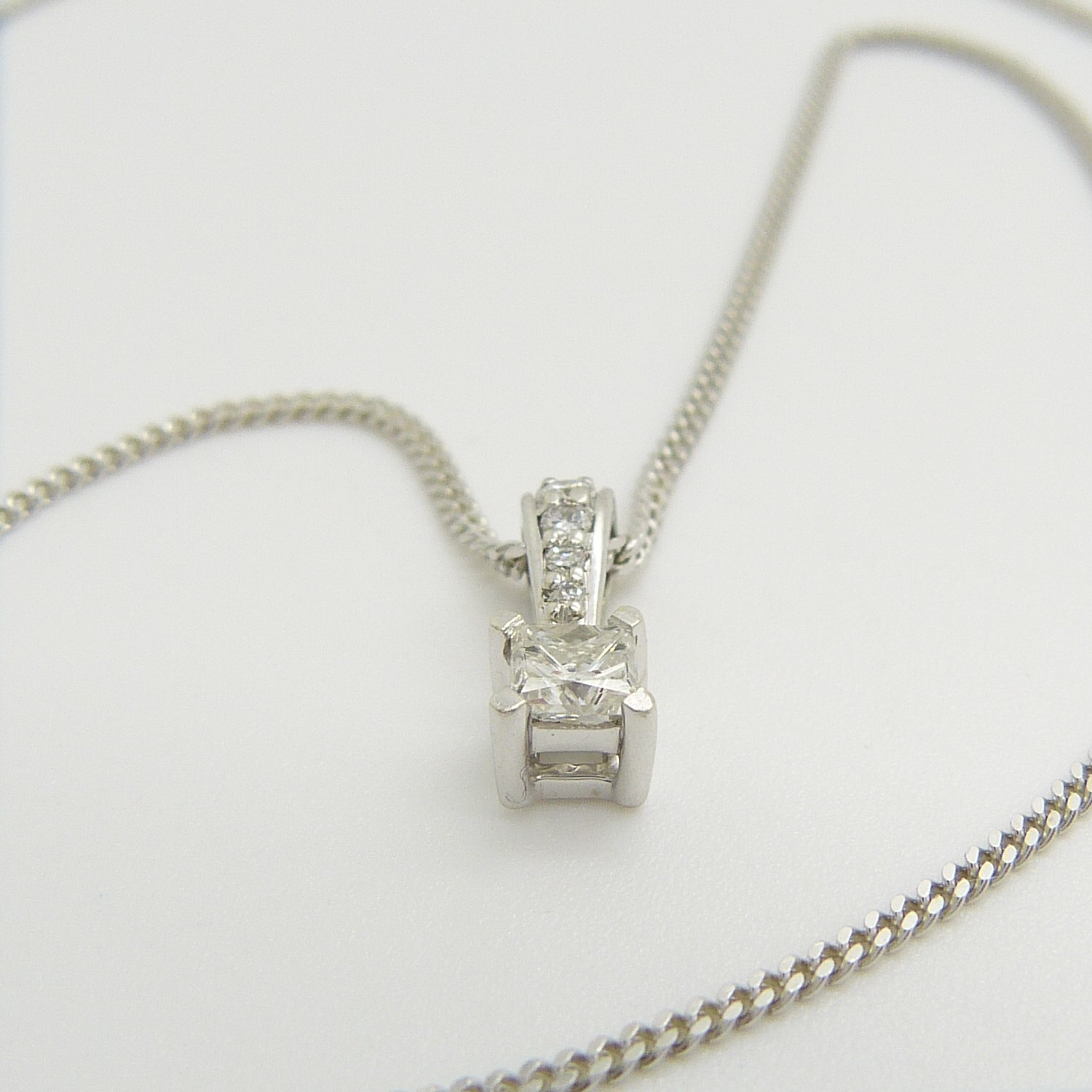 A pre-owned 0.30 carat princess-cut solitaire diamond pendant and chain, boxed - Image 8 of 9