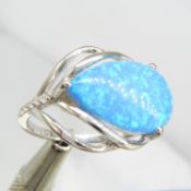 A blue opalite and cubic zirconia silver dress ring